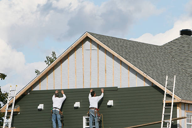 Professional Storm Damage Siding Repair technician working in Osceola Mills, PA